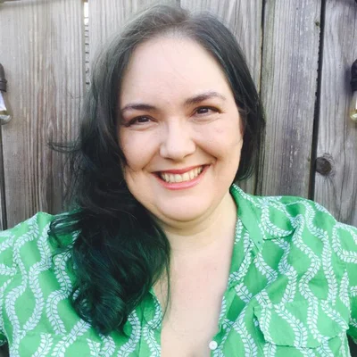 Elisabeth Payne, Certified Orientation and Mobility Specialist, smiling in a professional photo